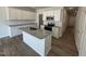 New kitchen with granite island and stainless appliances at 107 Central Townes Way # 298, Raleigh, NC 27603