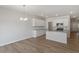Kitchen area with white cabinets and stainless steel appliances at 107 Central Townes Way # 298, Raleigh, NC 27603