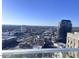 Aerial view of the cityscape, showing the building's location and surrounding area at 110 N Corcoran St # 2104, Durham, NC 27701