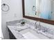 Elegant bathroom with marble countertop and sink at 110 N Corcoran St # 2104, Durham, NC 27701