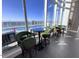 Club room with barstools and city views at 110 N Corcoran St # 2104, Durham, NC 27701