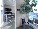 Club room with fireplace, TV, and seating area; access to the pool at 110 N Corcoran St # 2104, Durham, NC 27701