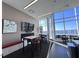 Club room with seating area and large screen TV at 110 N Corcoran St # 2104, Durham, NC 27701