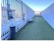 Modern dog park with artificial turf and waste station at 110 N Corcoran St # 2104, Durham, NC 27701