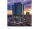 High-rise building with modern glass exterior in urban setting at 110 N Corcoran St # 2104, Durham, NC 27701