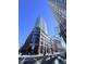 Modern high-rise building with brick and glass at 110 N Corcoran St # 2104, Durham, NC 27701