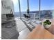 Modern living room with city views and floor to ceiling windows at 110 N Corcoran St # 2104, Durham, NC 27701