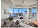 Spacious living room with floor-to-ceiling windows and city views at 110 N Corcoran St # 2104, Durham, NC 27701