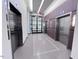 Lobby with elevators and modern design at 110 N Corcoran St # 2104, Durham, NC 27701