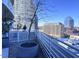 Rooftop terrace with city views and seating at 110 N Corcoran St # 2104, Durham, NC 27701