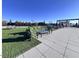 Relaxing rooftop terrace with seating and green space at 110 N Corcoran St # 2104, Durham, NC 27701
