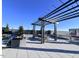 Rooftop terrace with pergola and grilling area at 110 N Corcoran St # 2104, Durham, NC 27701