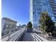 Rooftop terrace with city views and planters at 110 N Corcoran St # 2104, Durham, NC 27701