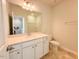 Bathroom features a large vanity, a big mirror, and a toilet at 111 Central Townes Way # 299, Raleigh, NC 27603