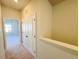 Hallway features a set of doors with a view into a sunlit room at the end at 111 Central Townes Way # 299, Raleigh, NC 27603