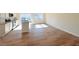 Open-concept kitchen with island, stainless appliances, and a large pantry at 111 Central Townes Way # 299, Raleigh, NC 27603