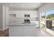 Beautiful kitchen featuring granite countertops, stainless steel appliances, and a bright, airy ambiance at 111 Central Townes Way # 299, Raleigh, NC 27603