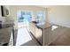 Stylish kitchen island featuring granite countertops and stainless steel appliances at 111 Central Townes Way # 299, Raleigh, NC 27603