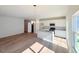 Open concept living area with modern kitchen and ample natural light at 111 Central Townes Way # 299, Raleigh, NC 27603