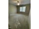 Bedroom featuring neutral walls, new carpet, bright windows, and a ceiling fan at 112 Gingergate Dr, Cary, NC 27519