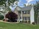 Beautiful two story brick home with a well manicured lawn at 112 Gingergate Dr, Cary, NC 27519