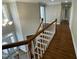 Inviting foyer with hardwood floors and elegant staircase, creating a grand entrance to the home at 112 Gingergate Dr, Cary, NC 27519
