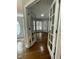 Foyer entrance showcasing hardwood floors and glass paneled doors at 112 Gingergate Dr, Cary, NC 27519