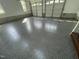 The epoxy-coated floor of the spacious 3-car garage is durable and easy to maintain at 112 Gingergate Dr, Cary, NC 27519