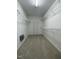 Empty walk-in closet with white wire shelving, providing ample storage space at 112 Gingergate Dr, Cary, NC 27519