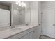 Bathroom featuring double vanity, large mirror, and a separate shower at 115 Central Townes Way # 300, Raleigh, NC 27603