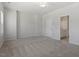Large bedroom with carpet floors and access to an ensuite bathroom at 115 Central Townes Way # 300, Raleigh, NC 27603