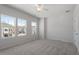 Spacious bedroom featuring a ceiling fan and three windows offering lots of natural light at 115 Central Townes Way # 300, Raleigh, NC 27603