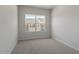 Bedroom featuring a double window offering lots of natural light at 115 Central Townes Way # 300, Raleigh, NC 27603