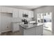 Modern kitchen with granite countertops, stainless steel appliances, and tile backsplash at 115 Central Townes Way # 300, Raleigh, NC 27603