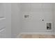 Laundry room features tile flooring and hookups, offering convenience for laundry tasks at 116 Fideaux Blvd # 258, Raleigh, NC 27603