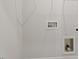 White-painted laundry room with hookups, ready for a modern washer and dryer at 119 Central Townes Way # 301, Raleigh, NC 27603