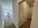 Open-concept living space with hardwood floors, island, and neutral color palette throughout the home at 119 Central Townes Way # 301, Raleigh, NC 27603