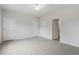 Neutral bedroom featuring a ceiling fan, two closets and two entrance doors at 120 Fideaux Blvd # 257, Raleigh, NC 27603