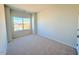 Bedroom with a large window that lets in plenty of natural light at 120 Fideaux Blvd # 257, Raleigh, NC 27603