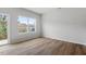 Bright living room featuring light hardwood floors and a sliding glass door at 120 Fideaux Blvd # 257, Raleigh, NC 27603