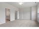 A spacious bedroom with plush carpet and ample closet space provides a comfortable retreat at 124 Fideaux Blvd # 256, Raleigh, NC 27603