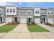 Charming townhomes with attached garages, lovely lawns, and neutral color schemes at 124 Fideaux Blvd # 256, Raleigh, NC 27603