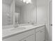 Bathroom featuring double sink vanity with white countertop and cabinets, plus shower and toilet at 128 Fideaux Blvd # 255, Raleigh, NC 27603