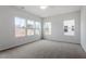 Spacious bedroom featuring plush carpet, abundant natural light, and a modern ceiling fan at 132 Fideaux Blvd # 254, Raleigh, NC 27603