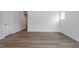 Bright and open living room features hardwood floors and a neutral color palette at 132 Fideaux Blvd # 254, Raleigh, NC 27603