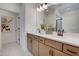 Modern bathroom boasting double sinks and a large mirror at 142 Vega Loop, Sanford, NC 27330