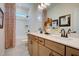 Bathroom with double vanity, tub shower combo, and updated fixtures at 142 Vega Loop, Sanford, NC 27330