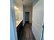 A bathroom with a double sink vanity and hardwood floors at 142 Vega Loop, Sanford, NC 27330