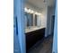 Modern bathroom with double sinks and a large mirror at 142 Vega Loop, Sanford, NC 27330
