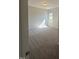 Bedroom features neutral walls, carpet, and one window bringing in natural light at 142 Vega Loop, Sanford, NC 27330